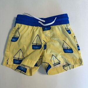The Beaufort Bonnet Company Yellow & Blue Sailboat Kids Swim Trunks